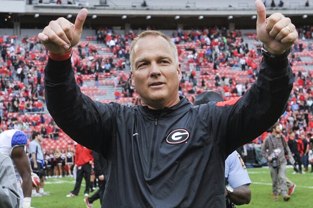 Georgia head coach Mark Richt gives a thumbs up to the crowd as he walks off the field after an NCAA college football game against Kentucky, Saturday, Nov. 7, 2015, in Athens, Ga. Georgia won 27-3. (AP Photo/John Amis)