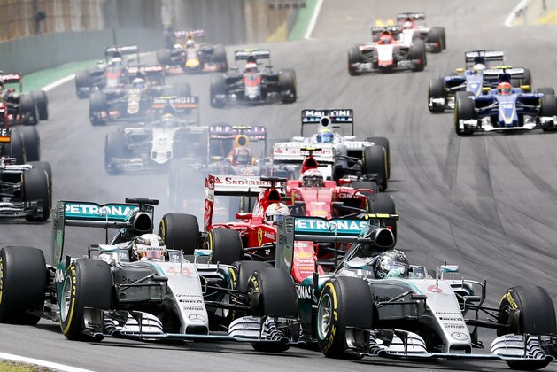 Mercedes driver Nico Rosberg, of Germany, leads the race  followed by teammate Lewis Hamilton, of Britain, after the start of the Formula One Brazilian Grand Prix at the Interlagos race track in Sao Paulo, Brazil, Sunday, Nov. 15, 2015. (AP Photo/Ricardo Mazalan)
