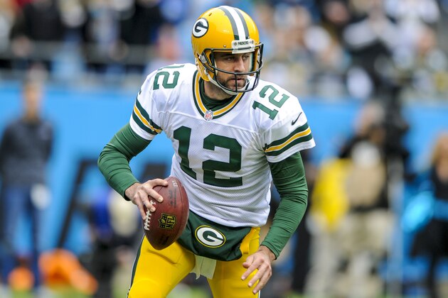 Green Bay Packers quarterback Aaron Rodgers (12) runs the ball during a NFL football game against the Carolina Panthers in Charlotte, NC, Sunday, Nov. 9, 2015. (AP Photo/Mike McCarn)