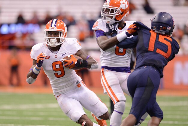 Nov 14, 2015; Syracuse, NY, USA; Clemson Tigers running back Wayne Gallman (9) carries the ball as wide receiver Deon Cain (8) blocks against the Syracuse Orange during the fourth quarter of a game at the Carrier Dome. Clemson won 37-27. Mandatory Credit: Mark Konezny-USA TODAY Sports
