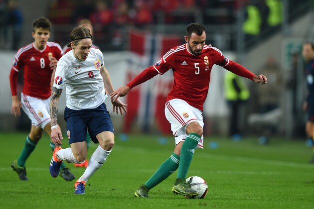 BUDAPEST, HUNGARY - NOVEMBER 15:  Attila Fiol of Hungary is closed down by Stefan Johansen of Norway during the UEFA EURO 2016 Qualifier Play-Off, second leg match between Hungary and Norway at Groupama Arena on November 15, 2015 in Budapest, Hungary.  (Photo by Shaun Botterill/Getty Images)