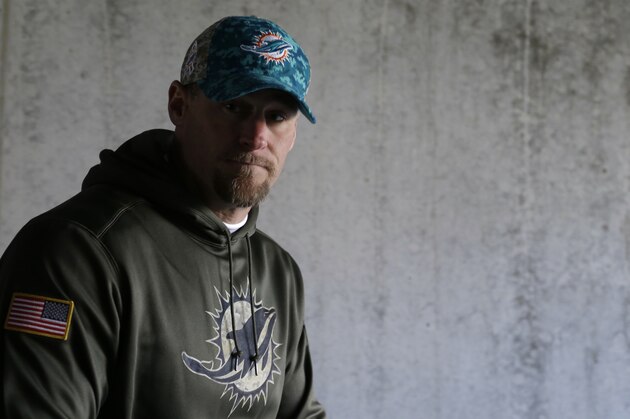 Miami Dolphins head coach Dan Campbell walks onto the field before an NFL football game against the Philadelphia Eagles, Sunday, Nov. 15, 2015, in Philadelphia. (AP Photo/Matt Rourke)