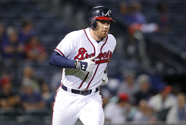Sep 10, 2015; Atlanta, GA, USA; Atlanta Braves first baseman Freddie Freeman (5) runs to first against the New York Mets in the eighth inning at Turner Field. Mandatory Credit: Brett Davis-USA TODAY Sports
