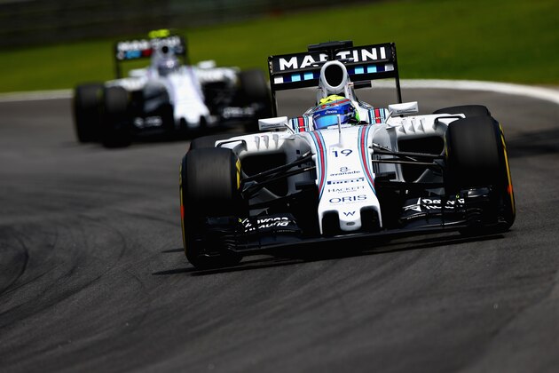 SAO PAULO, BRAZIL - NOVEMBER 14:  Felipe Massa of Brazil and Williams drives ahead of Valtteri Bottas of Finland and Williams during qualifying for the Formula One Grand Prix of Brazil at Autodromo Jose Carlos Pace on November 14, 2015 in Sao Paulo, Brazil.  (Photo by Clive Mason/Getty Images)