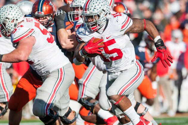 Ohio State running back Ezekiel Elliott (15) runs the ball during the second half of an NCAA football game against Illinois, Saturday, Nov. 14, 2015, at Memorial Stadium in Champaign, Ill. Ohio State won 28-3. (AP Photo/Bradley Leeb)