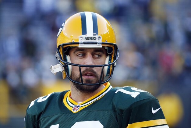 Green Bay Packers quarterback Aaron Rodgers warms up before an NFL football game against the Detroit Lions Sunday, Nov. 15, 2015, in Green Bay, Wis. (AP Photo/Mike Roemer)