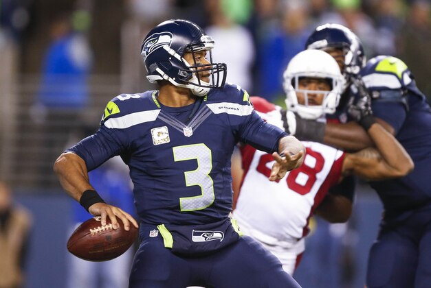 Nov 15, 2015; Seattle, WA, USA; Seattle Seahawks quarterback Russell Wilson (3) looks to pass against the Arizona Cardinals during the second quarter at CenturyLink Field. Mandatory Credit: Joe Nicholson-USA TODAY Sports