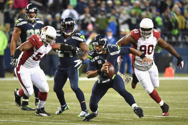 SEATTLE, WA - NOVEMBER 15:  Russell Wilson #3 of the Seattle Seahawks scrambles during the third quarter against the Arizona Cardinals at CenturyLink Field on November 15, 2015 in Seattle, Washington.  (Photo by Steve Dykes/Getty Images)