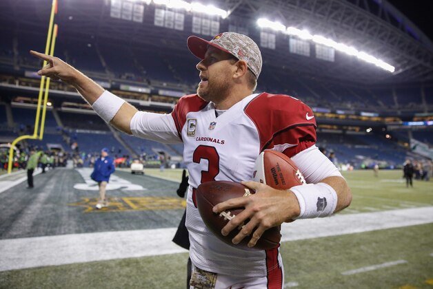 SEATTLE, WA - NOVEMBER 15:  Quarterback Carson Palmer #3 of the Arizona Cardinals heads off the field after defeating the Seattle Seahawks 39-32 at CenturyLink Field on November 15, 2015 in Seattle, Washington.  (Photo by Otto Greule Jr/Getty Images)