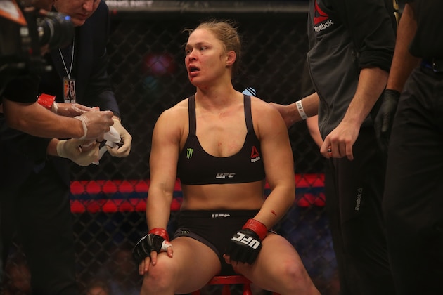 MELBOURNE, AUSTRALIA - NOVEMBER 15:  Ronda Rousey of the United States receives medical treatment after being defeated by Holly Holm of the United States in their UFC women's bantamweight championship bout during the UFC 193 event at Etihad Stadium on November 15, 2015 in Melbourne, Australia.  (Photo by Pat Scala /Zuffa LLC/Zuffa LLC via Getty Images)