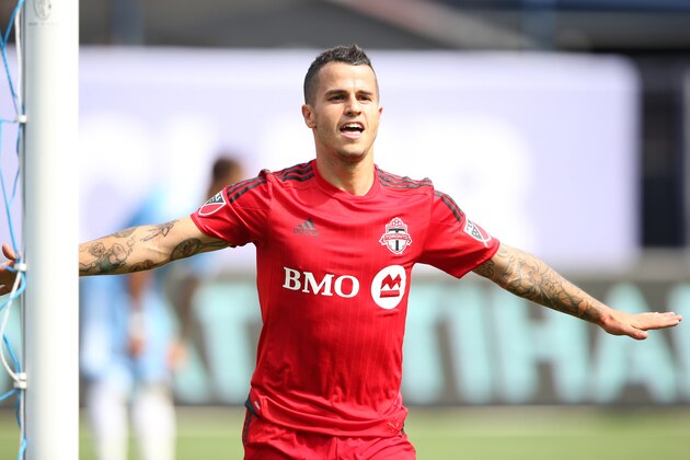 NEW YORK, USA - JULY 12:  Sebastian Giovinco of Toronto FC celebrates after scoring a goal to make it 3-2 during the MLS match between Toronto FC and New York City FC at Yankee Stadium on July 12, 2015 in New York City.  (Photo by Matthew Ashton - AMA/Getty Images)