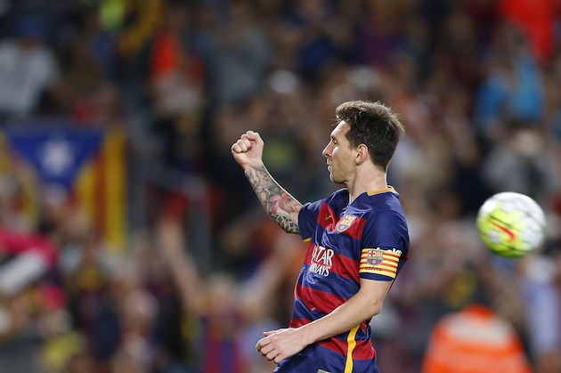 FC Barcelona's Lionel Messi celebrates after scoring during a Spanish La Liga soccer match against Levante at the Camp Nou stadium in Barcelona, Spain, Sunday, Sept. 20, 2015. (AP Photo/Manu Fernandez)