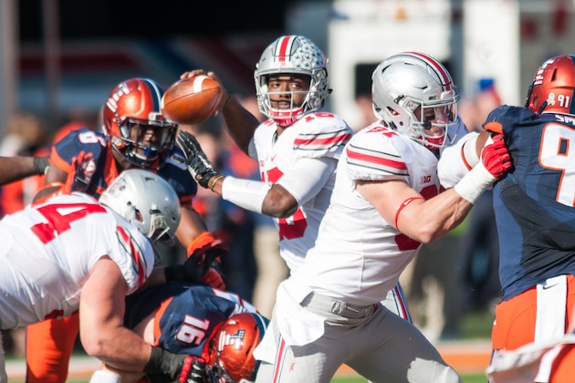 Ohio State quarterback J.T. Barrett (16) passes the ball during the first half of an NCAA football game against Illinois, Saturday, Nov. 14, 2015, in Champaign, Ill.  Ohio State won 28-3. (AP Photo/Bradley Leeb)