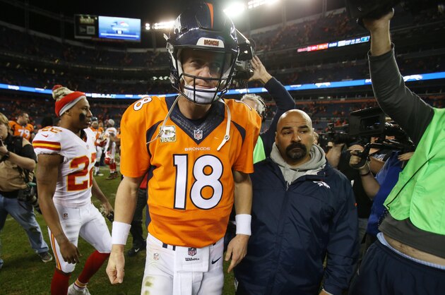 Nov 15, 2015; Denver, CO, USA; Denver Broncos quarterback Peyton Manning (18) leaves the field after the game against the Kansas City Chiefs at Sports Authority Field at Mile High. The Chiefs won 29-13. Mandatory Credit: Chris Humphreys-USA TODAY Sports