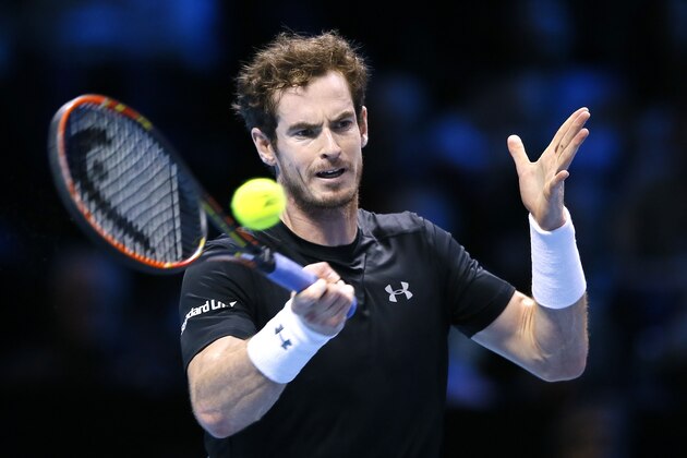 Andy Murray of Britain plays a return to David Ferrer of Spain during their singles tennis match at the ATP World Tour Finals at the O2 Arena in London, Monday, Nov. 16, 2015. (AP Photo/Kirsty Wigglesworth)