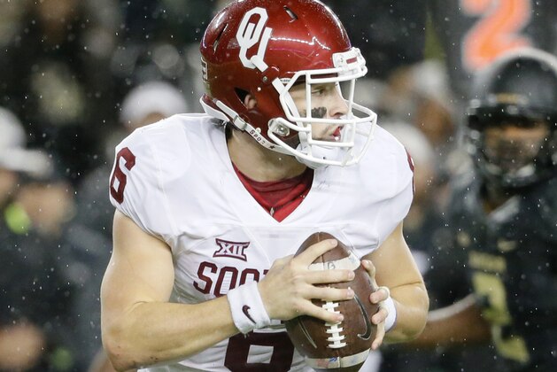 Oklahoma quarterback Baker Mayfield (6) prepares to throw a pass in the second half of an NCAA college football game against Baylor Saturday, Nov. 14, 2015, in Waco, Texas. Mayfield was 24 of 34 for 270 yards and three touchdowns and ran for a score to help Oklahoma to the 44-34 win. (AP Photo/Tony Gutierrez)