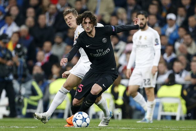 MADRID, SPAIN - NOVEMBER 3: Adrien Rabiot of PSG and Toni Kroos of Real Madrid in action during the UEFA Champions League match between Real Madrid and Paris Saint-Germain (PSG) at Santiago Bernabeu stadium on November 3, 2015 in Madrid, Spain. (Photo by Jean Catuffe/Getty Images)