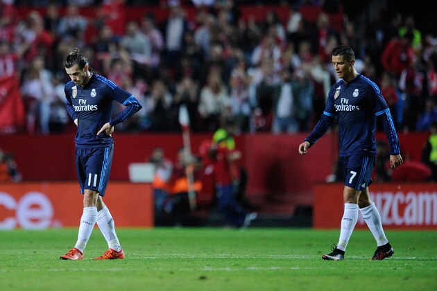 SEVILLE, SPAIN - NOVEMBER 08:  Cristiano Ronaldo and Gareth Bale of Real Madrid leaves the field after losing 3-2 to Sevilla  during the La Liga match between Sevilla FC and Real Madrid CF at Estadio Ramon Sanchez Pizjuan on November 8, 2015 in Seville, Spain.  (Photo by Denis Doyle/Getty Images)