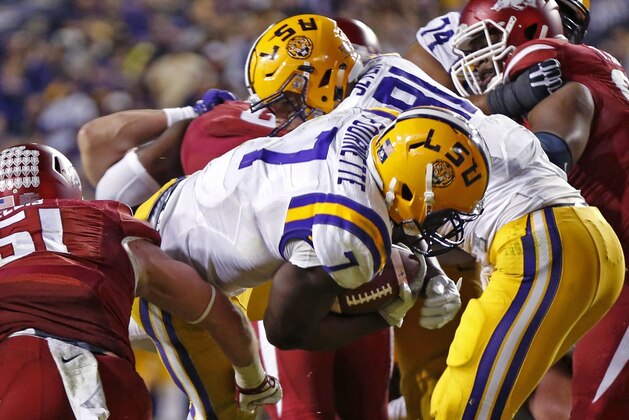 LSU running back Leonard Fournette (7) carries for a touchdown in the second half of an NCAA college football game against Arkansas in Baton Rouge, La., Saturday, Nov. 14, 2015. Arkansas won 31-14. (AP Photo/Gerald Herbert)