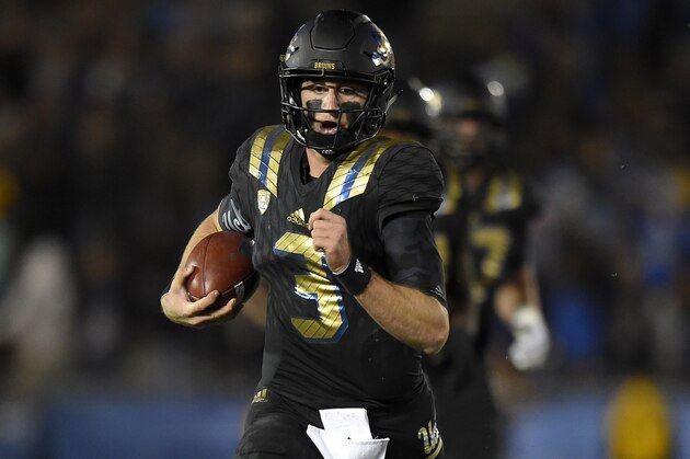UCLA quarterback Josh Rosen runs the ball during the second half of an NCAA college football game against Washington State, Saturday, Nov. 14, 2015, in Pasadena, Calif. Washington won 31-27. (AP Photo/Mark J. Terrill)