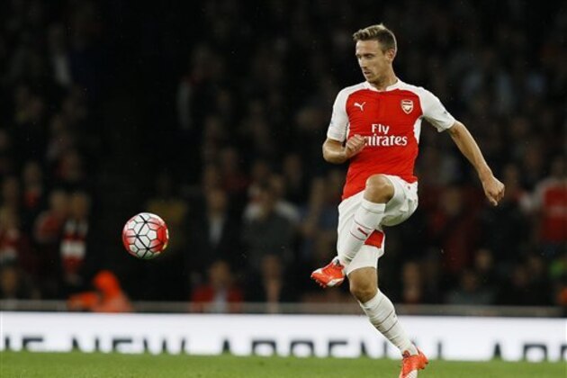 Arsenal's Nacho Monreal kicks the ball during the English Premier League soccer match between Arsenal and Liverpool at Emirates stadium in London, Monday, Aug. 24, 2015. (AP Photo/Kirsty Wigglesworth)