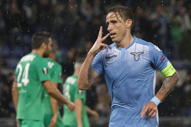 Lazio’s Lucas Biglia celebrates after scoring during an Europa League Group C soccer match between Lazio and Saint-Etienne, at Rome's Olympic stadium, Thursday, Oct. 1, 2015. (AP Photo/Riccardo De Luca)