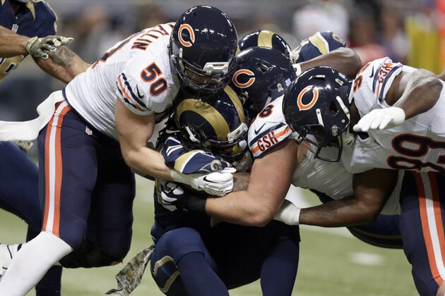 St. Louis Rams running back Todd Gurley is stopped by Chicago Bears defenders during the first quarter of an NFL football game Sunday, Nov. 15, 2015, in St. Louis. (AP Photo/Tom Gannam)