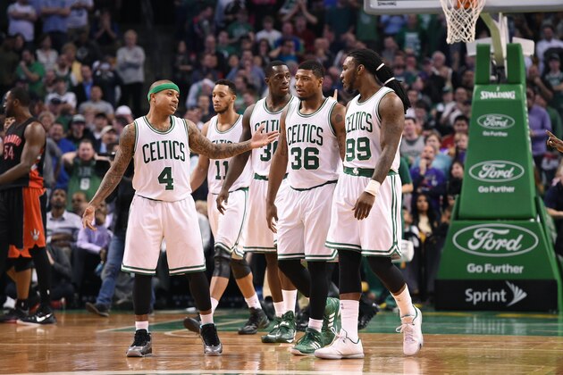 BOSTON, MA - APRIL 14: Isaiah Thomas #4, Evan Turner #11, Brandon Bass #30, Marcus Smart #36 and Jae Crowder #99 of the Boston Celtics during the game against the Toronto Raptors on April 14, 2015 at the TD Garden in Boston, Massachusetts. NOTE TO USER: User expressly acknowledges and agrees that, by downloading and or using this photograph, User is consenting to the terms and conditions of the Getty Images License Agreement. Mandatory Copyright Notice: Copyright 2015 NBAE (Photo by Brian Babineau/NBAE via Getty Images)
