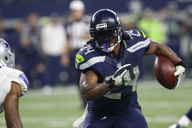 Seattle Seahawks running back Marshawn Lynch runs the ball against the Dallas Cowboys during an NFL football game Sunday, Nov. 1, 2015, in Arlington, Texas. (AP Photo/Roger Steinman)
