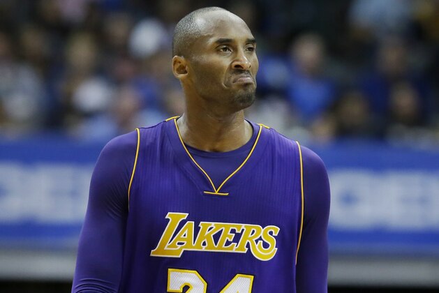 Los Angeles Lakers forward Kobe Bryant (24) reacts to a call during the second half of an NBA basketball game against the Dallas Mavericks Friday, Nov. 13, 2015, in Dallas. (AP Photo/LM Otero)