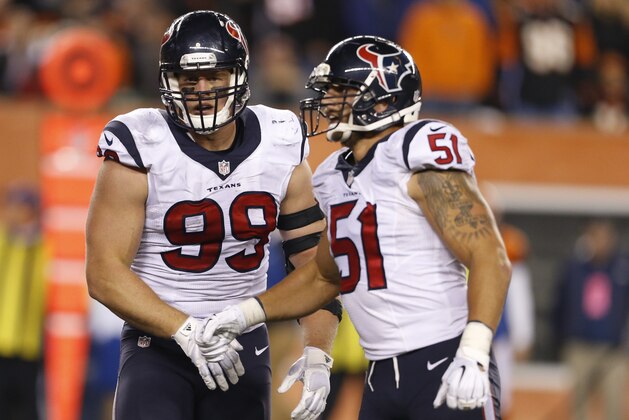 Houston Texans defensive end J.J. Watt (99) and inside linebacker Benardrick McKinney (55) in the second half of an NFL football game against the Cincinnati Bengals in Cincinnati, Monday, Nov. 16, 2015.  (AP Photo/Gary Landers)