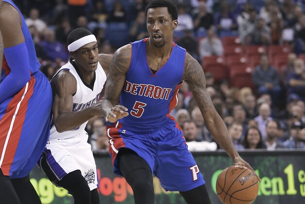 Detroit Pistons guard Kentavious Caldwell-Pope, right, drives against Sacramento Kings guard Rajon Rondo during the first quarter of an NBA basketball game in Sacramento, Calif., Wednesday, Nov. 11, 2015. (AP Photo/Rich Pedroncelli)