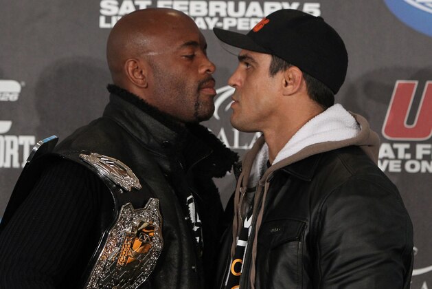 LAS VEGAS - FEBRUARY 02:  (L-R) Middleweight Champion Anderson Silva faces off with opponent Vitor Belfort at the UFC 126 pre-fight press conference at the Mandalay Bay Resort and Casino on February 2, 2011 in Las Vegas, Nevada.  (Photo by Josh Hedges/Zuffa LLC/Zuffa LLC via Getty Images)