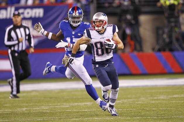 New England Patriots' Danny Amendola (80) runs away from New York Giants' Dwayne Harris (17) during the second half of an NFL football game Sunday Nov. 15, 2015, in East Rutherford, N.J. (AP Photo/Gary Hershorn)