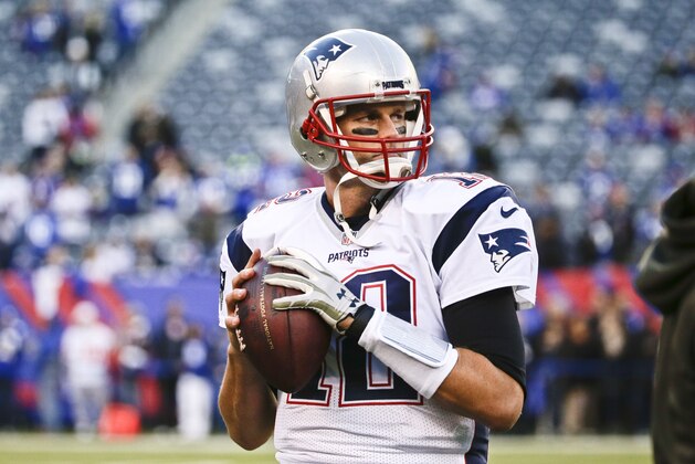 New England Patriots quarterback Tom Brady (12) warms up before an NFL football game against the New York Giants Sunday Nov. 15, 2015, in East Rutherford, N.J. (AP Photo/Julie Jacobson)