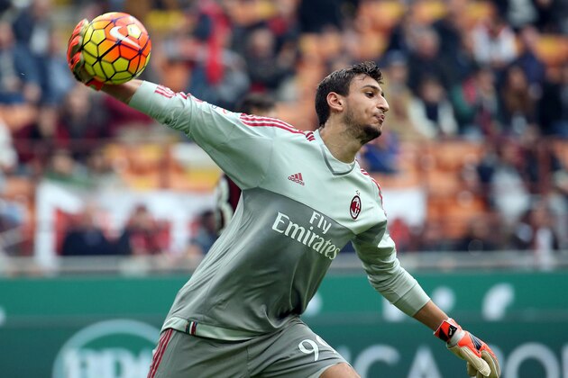 In this photo taken on Sunday, Oct. 25, 2015, AC Milan goalkeeper Gianluigi Donnarumma throws the ball during a Serie A soccer match between AC Milan and Sassuolo at the Milan San Siro stadium, Italy. AC Milan teenager Gianluigi Donnarumma became the youngest goalkeeper to start a Serie A match on Sunday when he made his debut for the club at the age of 16 years, 8 months, 6 days. (Daniele Mascolo/ANSA via AP)