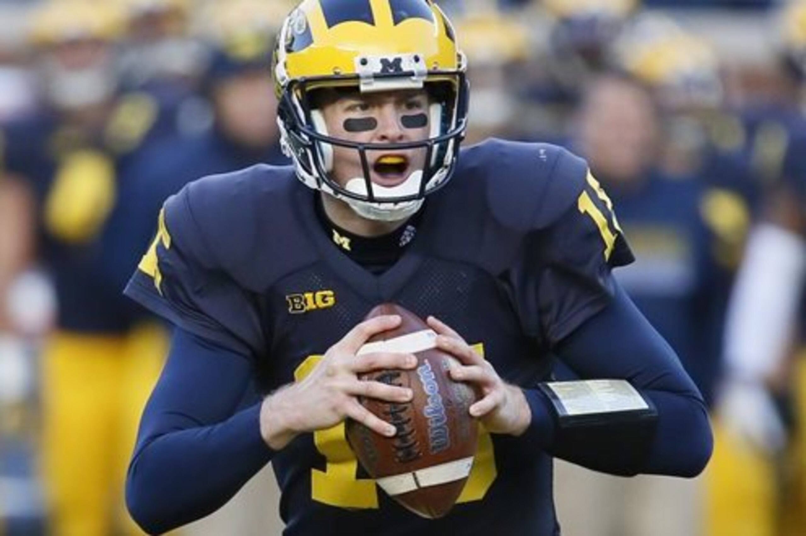 Michigan quarterback Jake Rudock looks to pass against Rutgers during the first half of an NCAA college football game Saturday, Nov. 7, 2015, in Ann Arbor, Mich. Rudock threw for two touchdowns and a career-high 337 yards in a 49-16 win over Rutgers. (AP Photo/Duane Burleson)