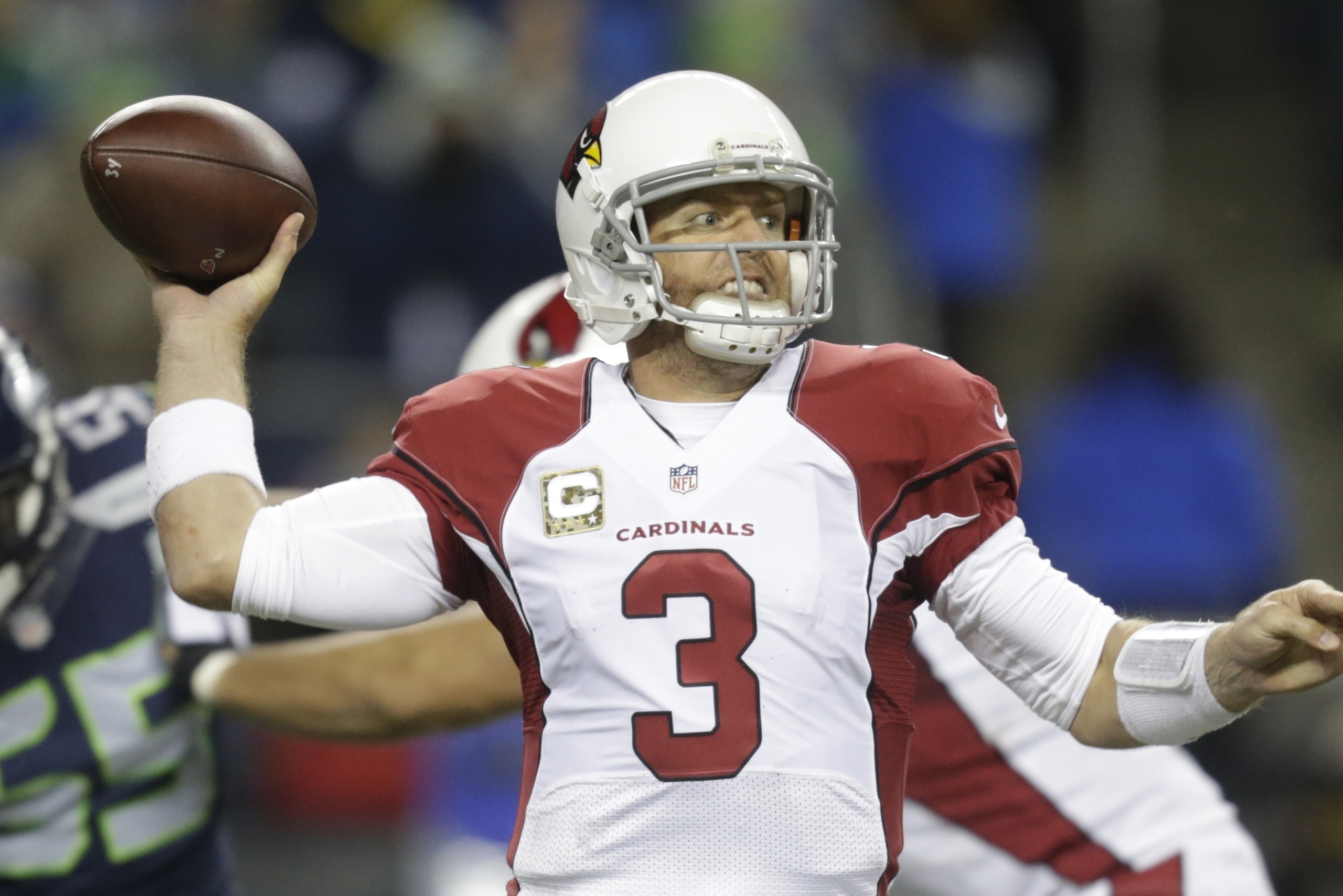 Arizona Cardinals quarterback Carson Palmer passes against the Seattle Seahawks in the second half of an NFL football game, Sunday, Nov. 15, 2015, in Seattle. (AP Photo/Stephen Brashear)