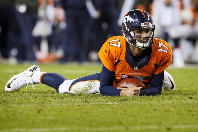 Denver Broncos quarterback Brock Osweiler (17) lies on the turf after being tackled against the Kansas City Chiefs during the second half of an NFL football game, Sunday, Nov. 15, 2015, in Denver. (AP Photo/Joe Mahoney)