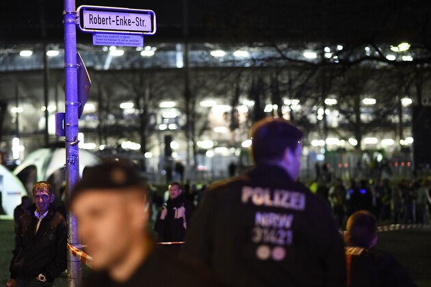 HANOVER, GERMANY - NOVEMBER 17:  Police forces secure a scene at Robert-Enke-Strasse after finding a suspicious piece of luggage prior the match Germany against the Netherlands at the HDI-Arena on November 17, 2015 in Hanover, Germany. The German Federal Police raised the number of heavy equipped Police officers inside the main train station of Hanover, the airport of Hanover as well as at the HDI-Arena in order to increase the safety, after the attacks in Paris last week. German chancellor Angela Merkel (CDU) and members of the German Federal cabinet are expected to be among the guests at the match.  (Photo by Alexander Koerner/Getty Images)