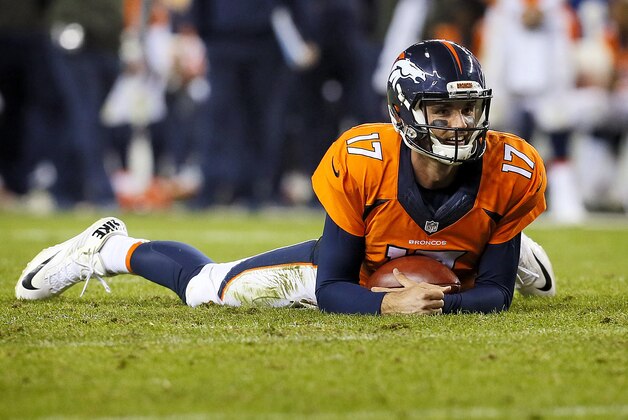 Denver Broncos quarterback Brock Osweiler (17) lies on the turf after being tackled against the Kansas City Chiefs during the second half of an NFL football game, Sunday, Nov. 15, 2015, in Denver. (AP Photo/Joe Mahoney)