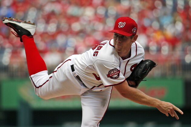 Washington Nationals starting pitcher Stephen Strasburg throws during the first inning of a baseball game against the Miami Marlins at Nationals Park, Sunday, Aug. 30, 2015, in Washington. (AP Photo/Alex Brandon)