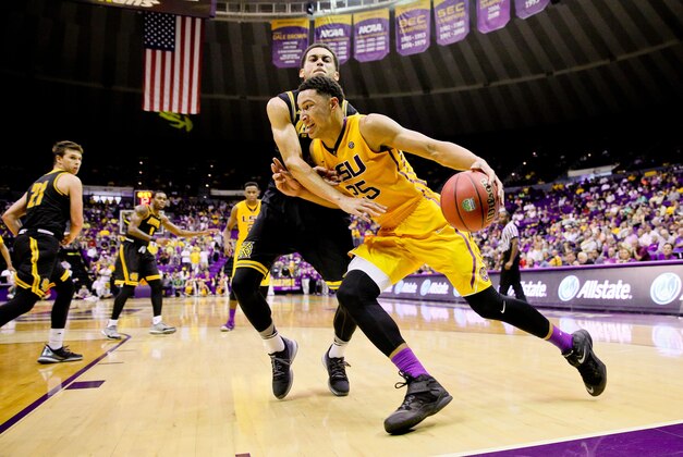 Nov 16, 2015; Baton Rouge, LA, USA; LSU Tigers forward Ben Simmons (25) drives past Kennesaw State Owls forward Jordan Jones (2) during the second half of a game at the Pete Maravich Assembly Center. LSU defeated Kennesaw State 91-69. Mandatory Credit: Derick E. Hingle-USA TODAY Sports