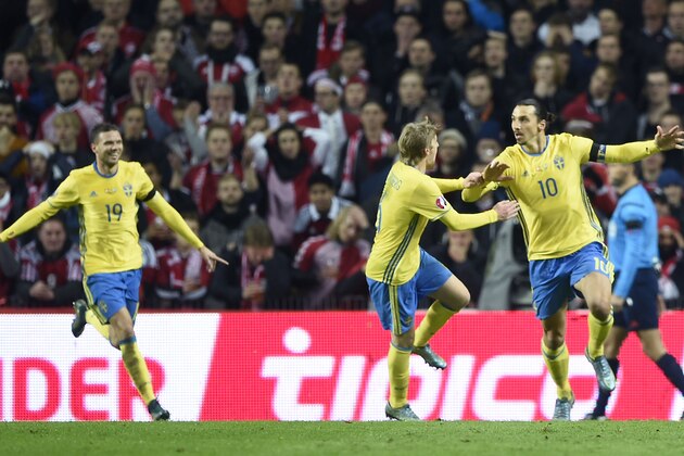Sweden's Zlatan Ibrahimovic, right, celebrates scoring during the Euro 2016 qualifier play-off second leg soccer match against Denmark at Parken Stadium in Copenhagen, Denmark, Tuesday Nov. 17, 2015. (Lars Poulsen/Polfoto via AP) DENMARK OUT