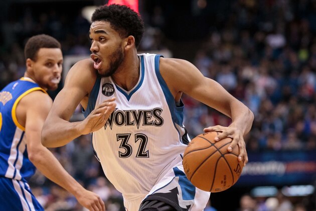 Nov 12, 2015; Minneapolis, MN, USA; Minnesota Timberwolves center Karl-Anthony Towns (32) dribbles in the third quarter against the Golden State Warriors at Target Center. The Golden State Warriors beat he Minnesota Timberwolves 129-116. Mandatory Credit: Brad Rempel-USA TODAY Sports
