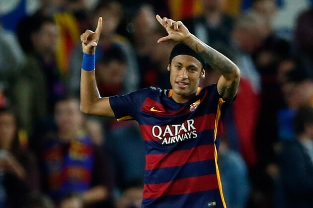 Barcelona's Neymar celebrates after scoring his side’s third goal during the Champions League Group E soccer match between FC Barcelona and BATE Borisov at the Camp Nou stadium in Barcelona, Spain, Wednesday, Nov. 4, 2015. (AP Photo/Manu Fernandez)