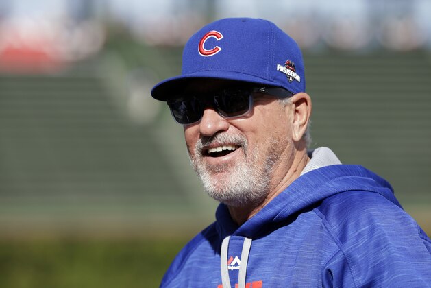 Chicago Cubs manager Joe Maddon smiles as he watches batting practice before Game 3 in baseball's National League Division Series against the St. Louis Cardinals, Monday, Oct. 12, 2015, in Chicago. (AP Photo/Nam Y. Huh)