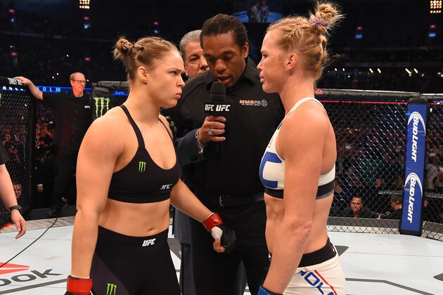 MELBOURNE, AUSTRALIA - NOVEMBER 15:  (L-R) Opponents UFC women's bantamweight champion Ronda Rousey of the United States and Holly Holm of the United States face off before their UFC women's bantamweight championship bout during the UFC 193 event at Etihad Stadium on November 15, 2015 in Melbourne, Australia. (Photo by Josh Hedges/Zuffa LLC/Zuffa LLC via Getty Images)