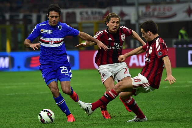 Sampdoria's forward from Brazil Eder (L) fights for the ball with AC Milan's midfielder Alessio Cerci (C) and AC Milan's midfielder Giacomo Bonaventura during the Italian Serie A football match between AC Milan and Sampdoria at San Siro Stadium in Milan on April 12, 2015. AFP PHOTO / GIUSEPPE CACACE        (Photo credit should read GIUSEPPE CACACE/AFP/Getty Images)