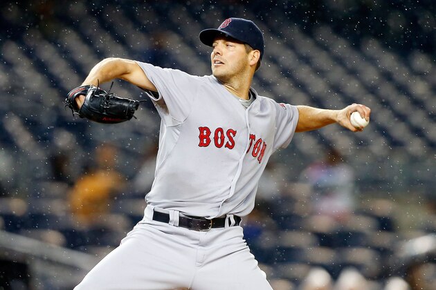 NEW YORK, NY - OCTOBER 01:  (NEW YORK DAILIES OUT)    Rich Hill #62 of the Boston Red Sox in action against the New York Yankees at Yankee Stadium on October 1, 2015 in the Bronx borough of New York City. The Yankees defeated the Red Sox 4-1. The Yankees clinched a wildcard playoff position and won their 10,000th regular season game.  (Photo by Jim McIsaac/Getty Images)
